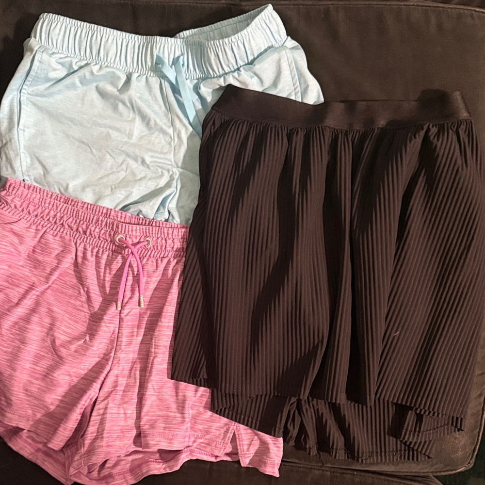 Trio of Women's Shorts in Pink, Light Blue, and Black